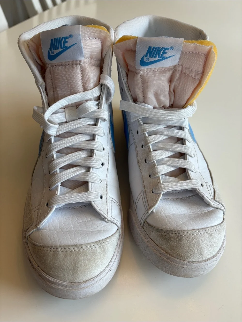 Nike Blazers Women’s High-Top Sneakers in White and Light Blue Swoosh